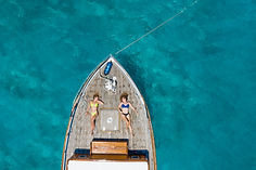 Sunbathing on the deck of a yacht