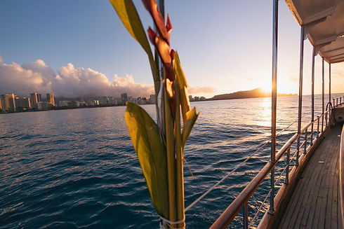 Sunrise over diamond head from a boat