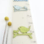 Cream background height chart with birds on twigs design