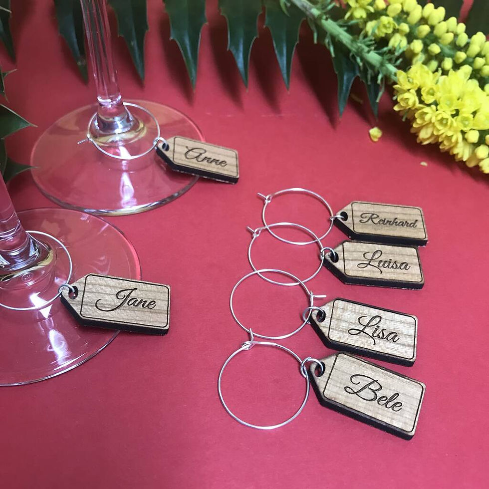 personalised wine glass charms attached to champagne flute
