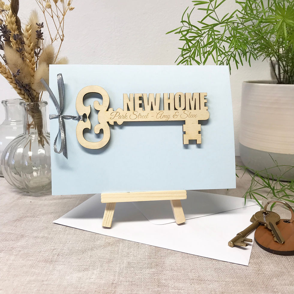 Thumbnail: Rustic kraft card with wooden key design, perfect new home gift