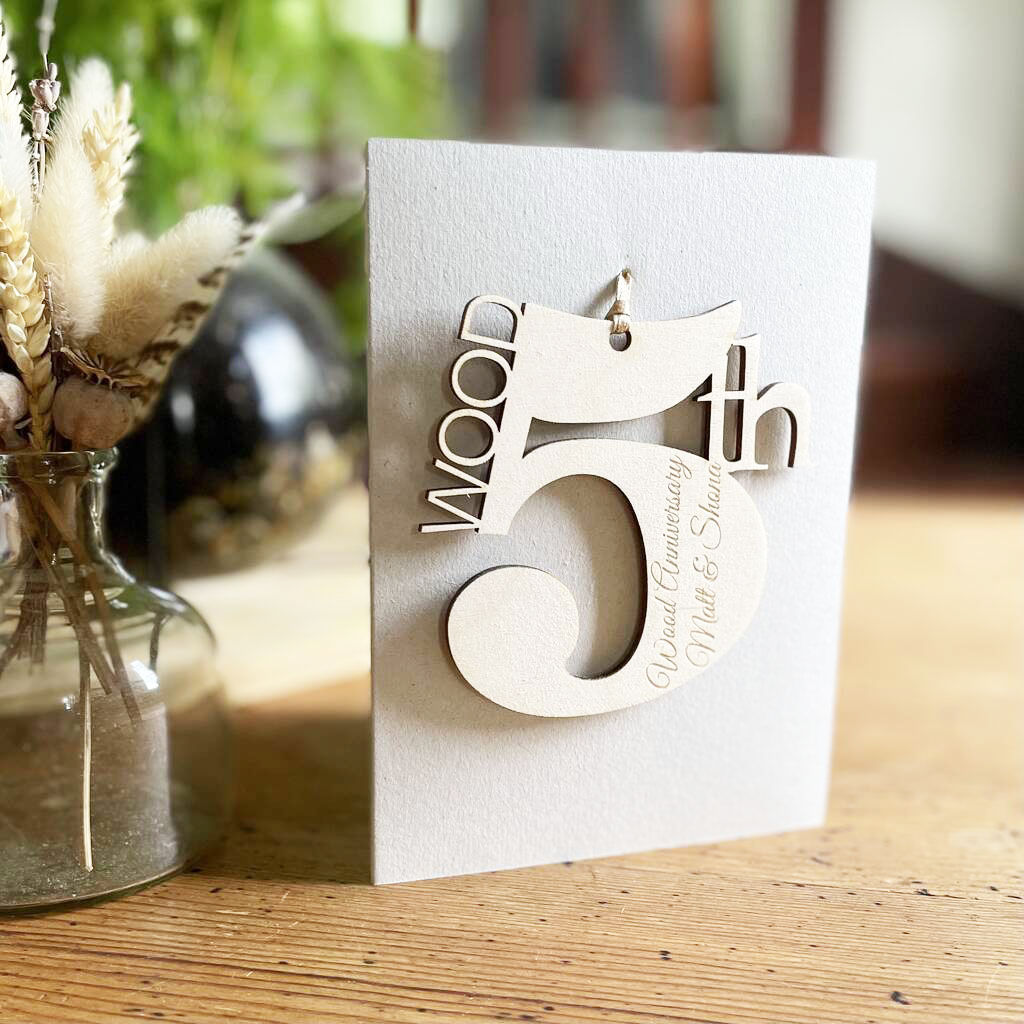 wooden engraved 5th Wooden Anniversary Meaning Card on pale grey card