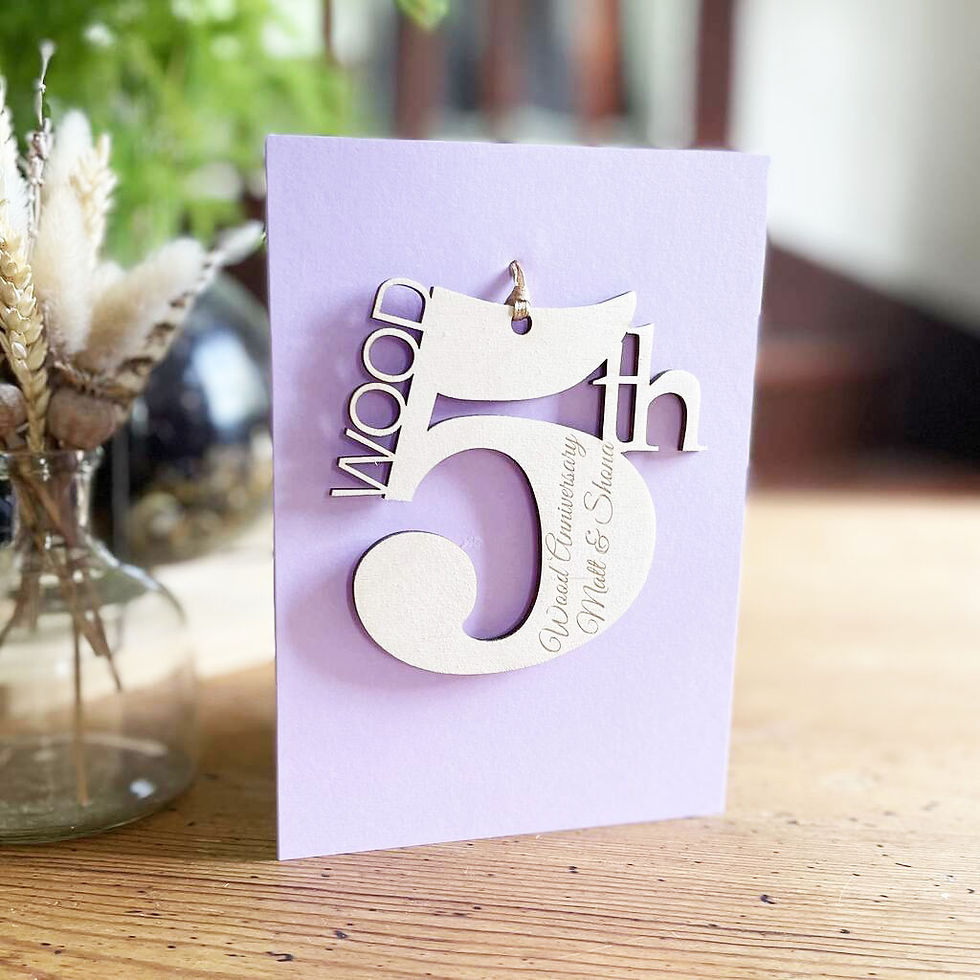 Thumbnail: Personalised Lilac 5th Wooden Anniversary Meaning Card on a wooden table with dried flowers