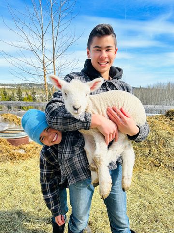 Children and lamb
