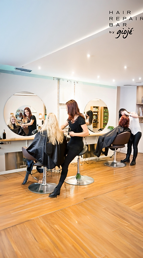 Busy hair salon with hairstylists and clients