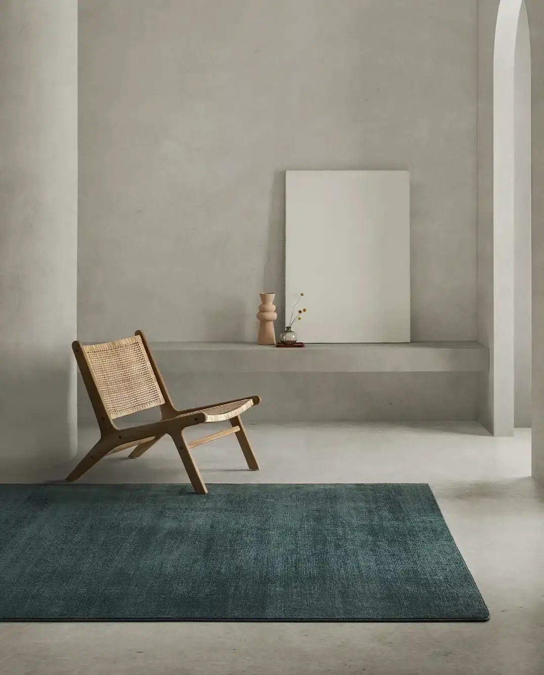 zaļš mīksts dizaina paklājs Rols Luna interjerā