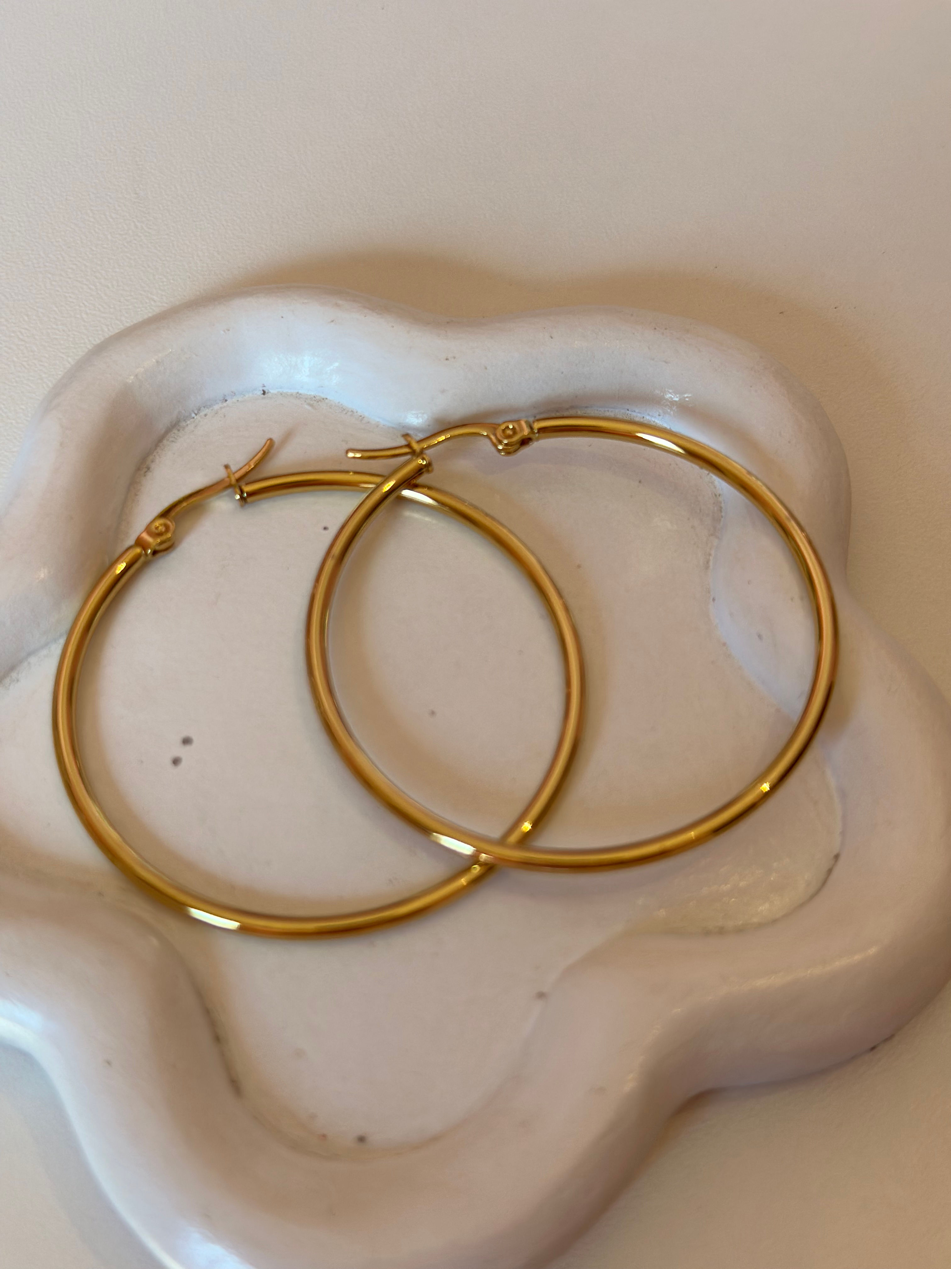 Aros en acero dorado 4.5 cm 