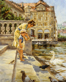 A mother coaxes her toddler son to feed the swans, on the steps leading to the river in Lucerne, Switzerland.