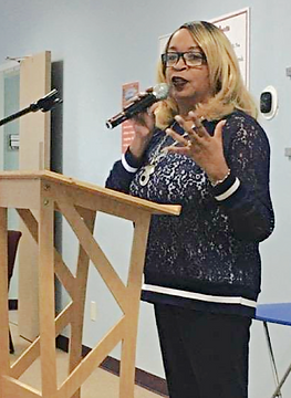 EVON WITH MIC W-BKGD.png