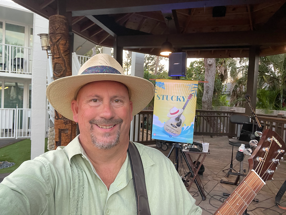 Stucky is poolside at Chef Rolf's Tiki Bar