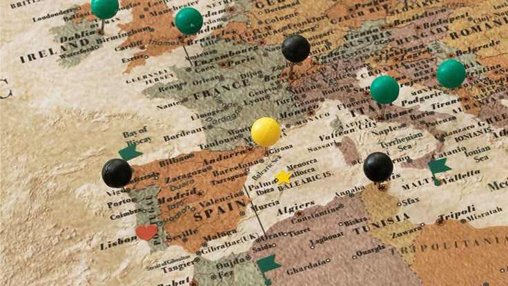 Vintage map of Europe and the Mediterranean with colourful destination pins marking international wedding locations