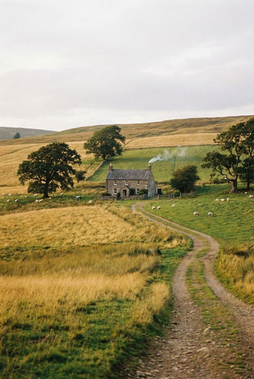 Rustic countryside farmhouse estate in rolling hills with winding dirt road – secluded Georgian wine country retreat venue for intimate exclusive-use corporate offsites