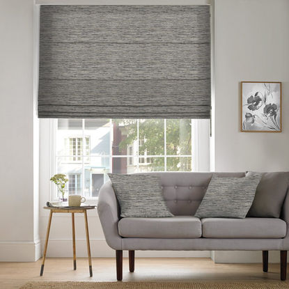 grey blind in living room.
