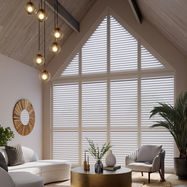 Shaped shutters in a gable end