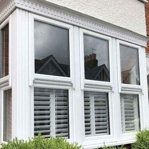 Square Edwrdian bay window fitted with our shutters in central Leighton Buzzard