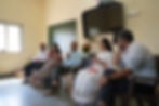 Government stakeholders, teachers, and LFE members discussing teaching in model cluster schools versus single-teacher schools, covered under the District Transformation Project, during an immersion visit.