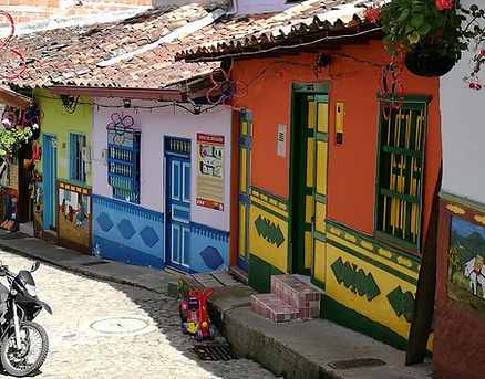 rana tours colombia · viaje a colombia · guía local · bogotá · monserrate · museo del oro · puerto asís · mocoa · putumayo · puerto limón · tubing · río caquetá · armonización espiritual · taita josé · cascada fin del mundo · san agustín · parque arqueológico · desierto de la tatacoa · salento · valle del cocora · finca el ocaso · cultura cafetera · medellín · guatapé · santa marta · parque tayrona · cabo san juan · playa cristal · cartagena de indias · islas del rosario · aventura auténtica