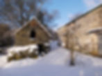 The piggery and barns in snow