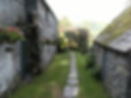 Path from parking area down to house