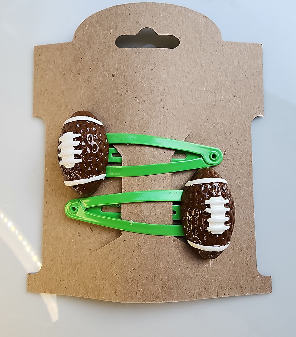 Green snap clip set with football charms.