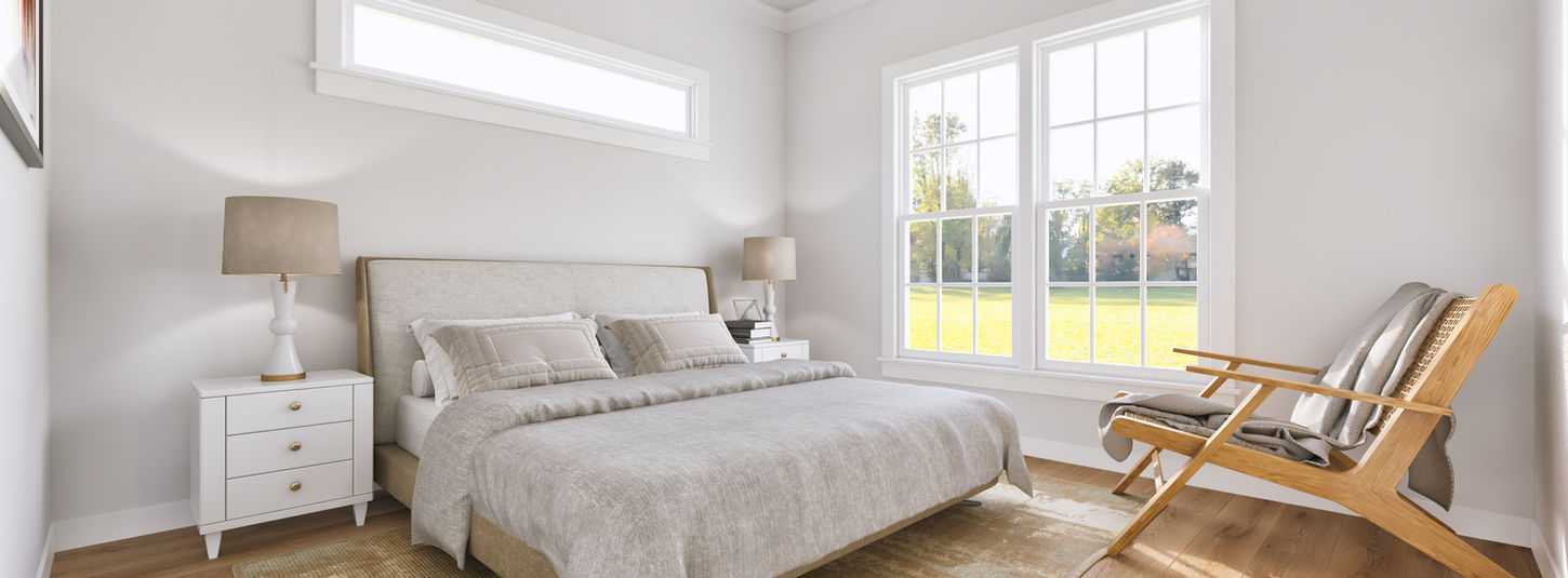 Cozy bedroom with neutral bedding and natural light