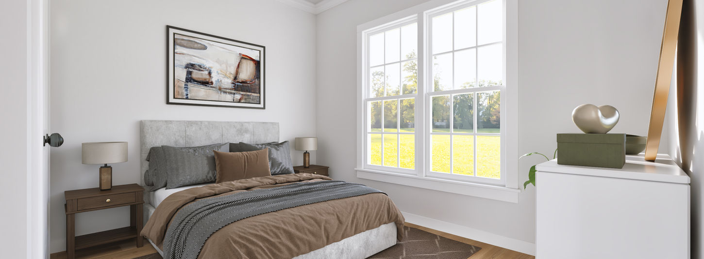 Spacious bedroom with large windows