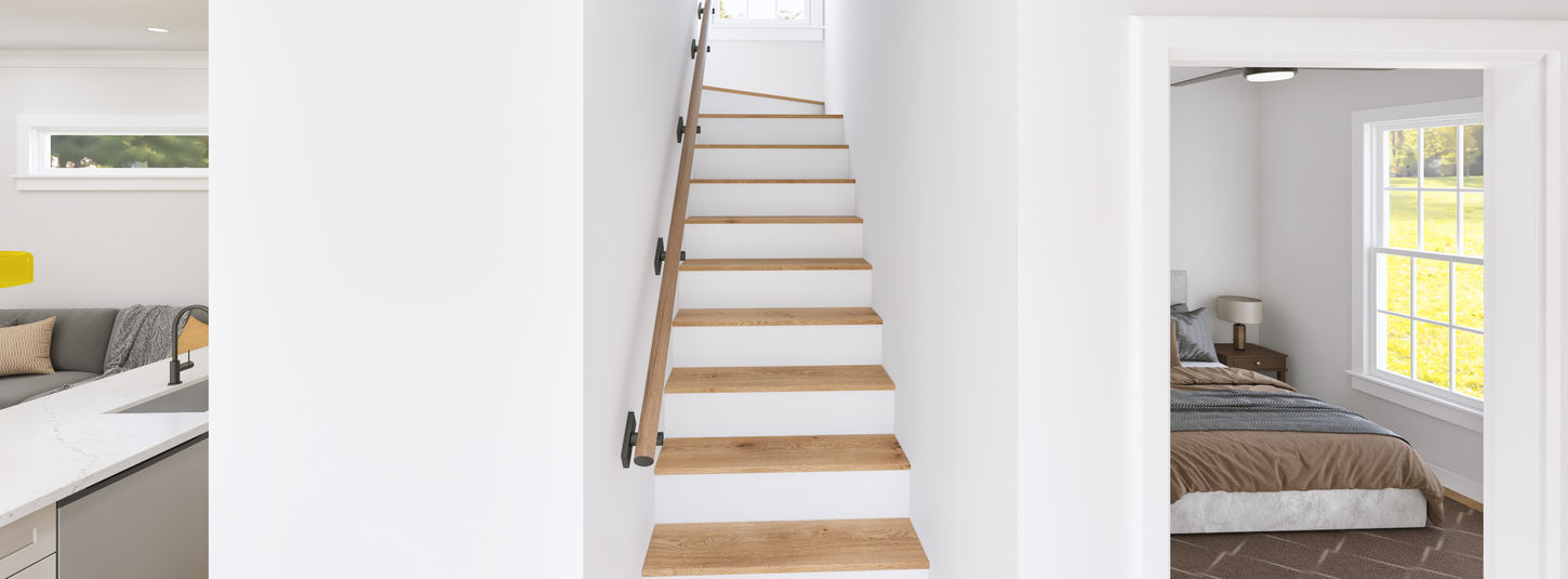 Staircase with views into adjacent bedrooms