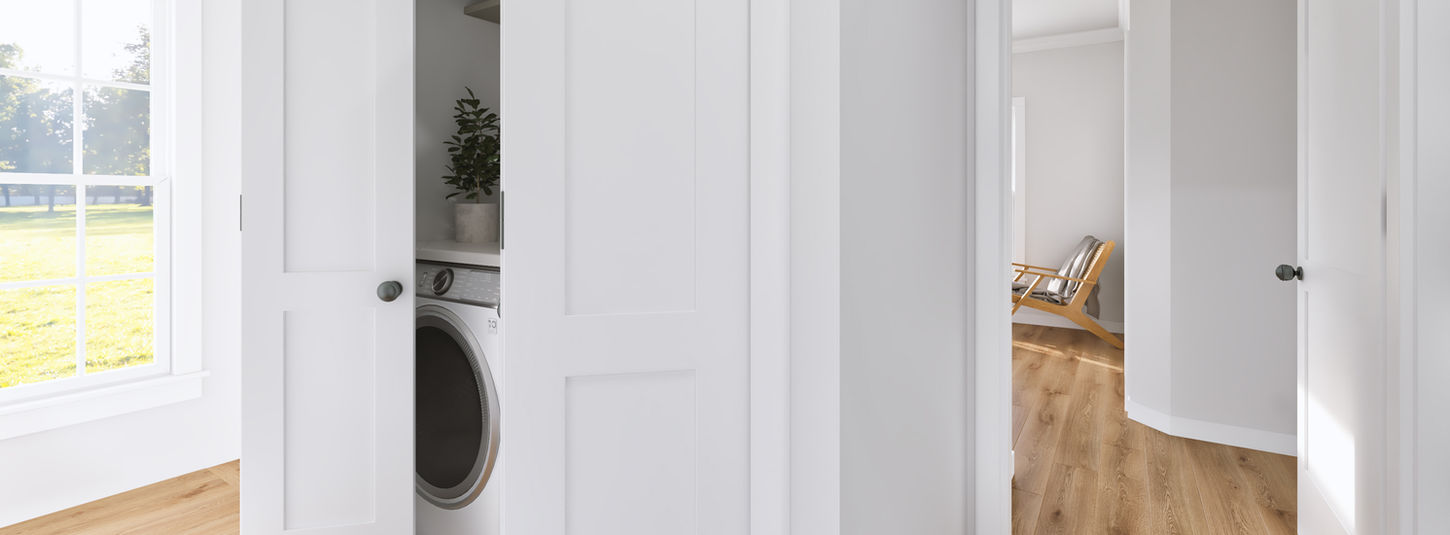 Hallway leading to laundry room and bedroom