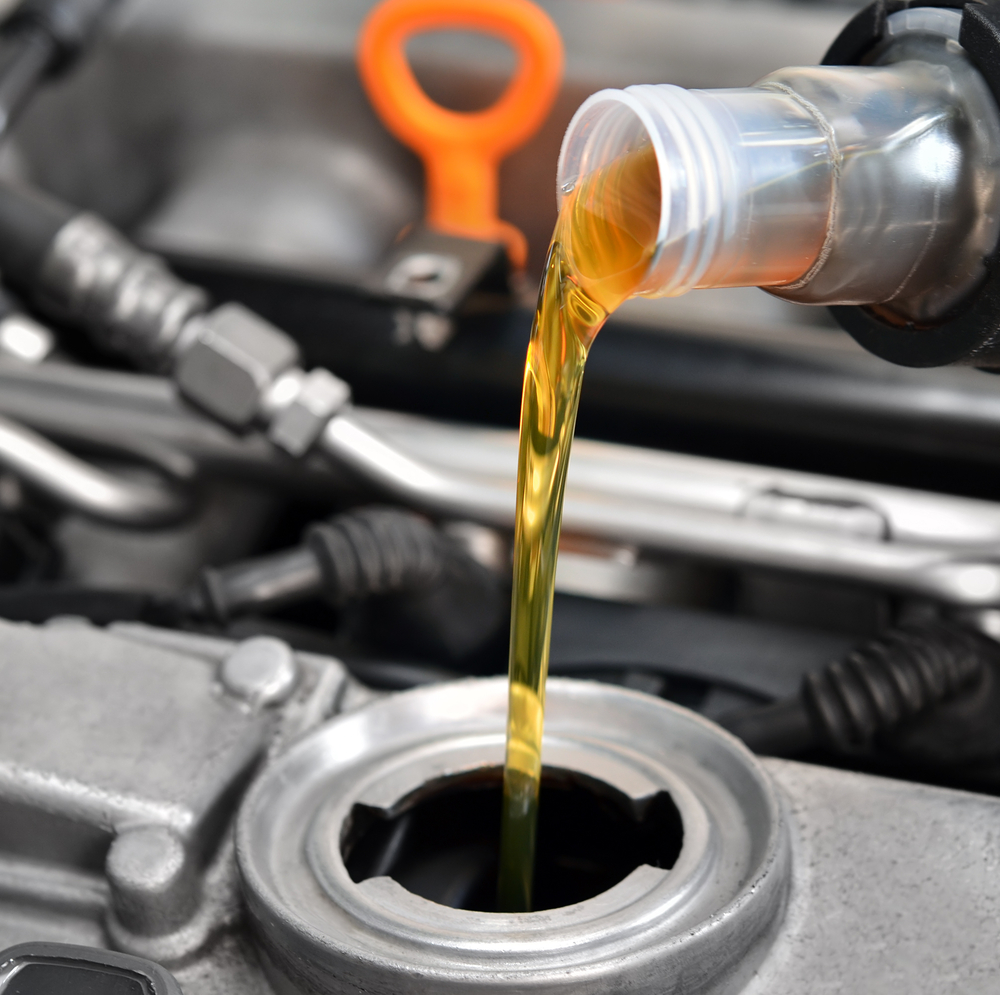 Oil being poured during a vehicle service