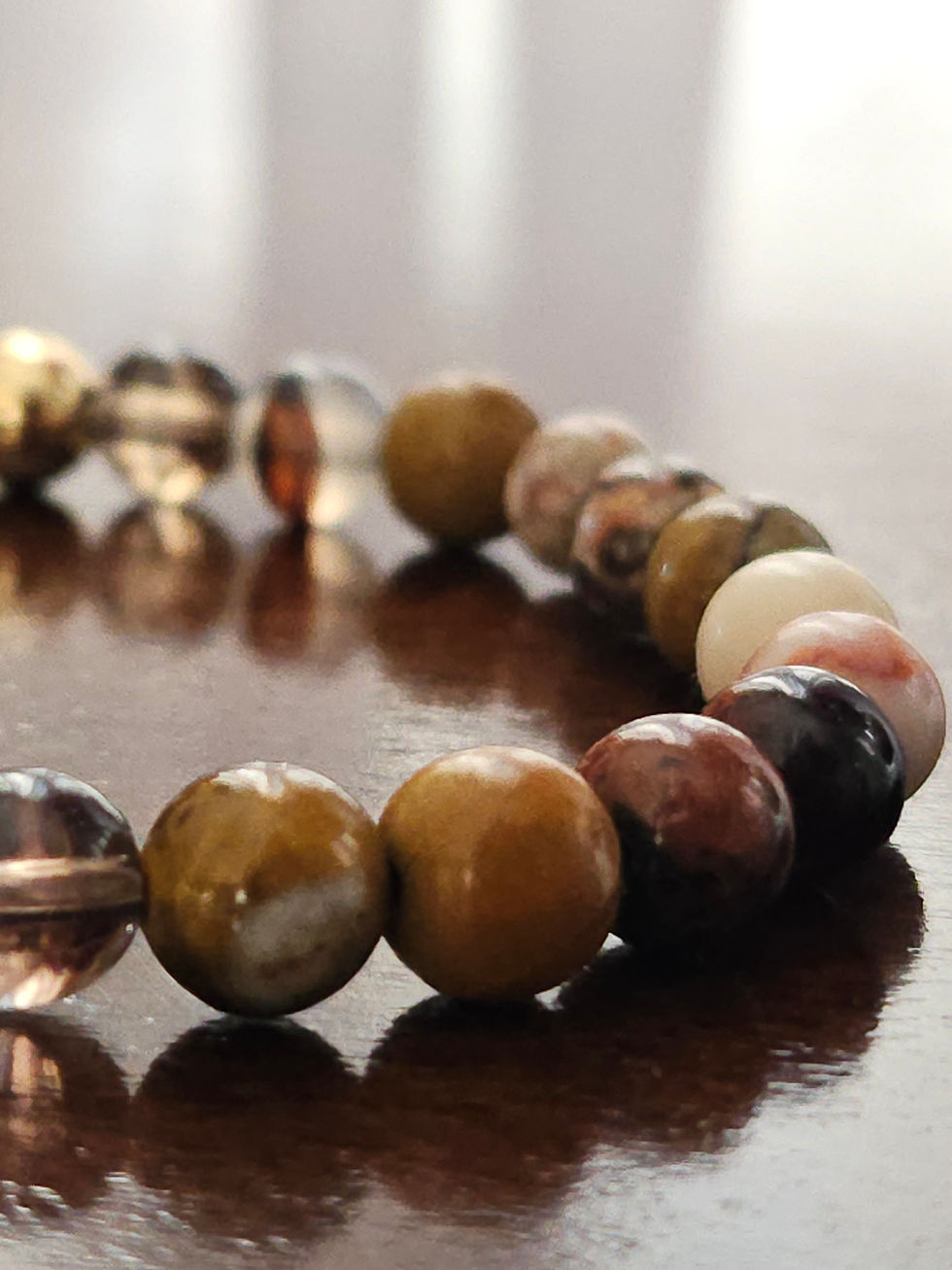 Mixed Stone Bracelet Close Up View on Dining Room Table