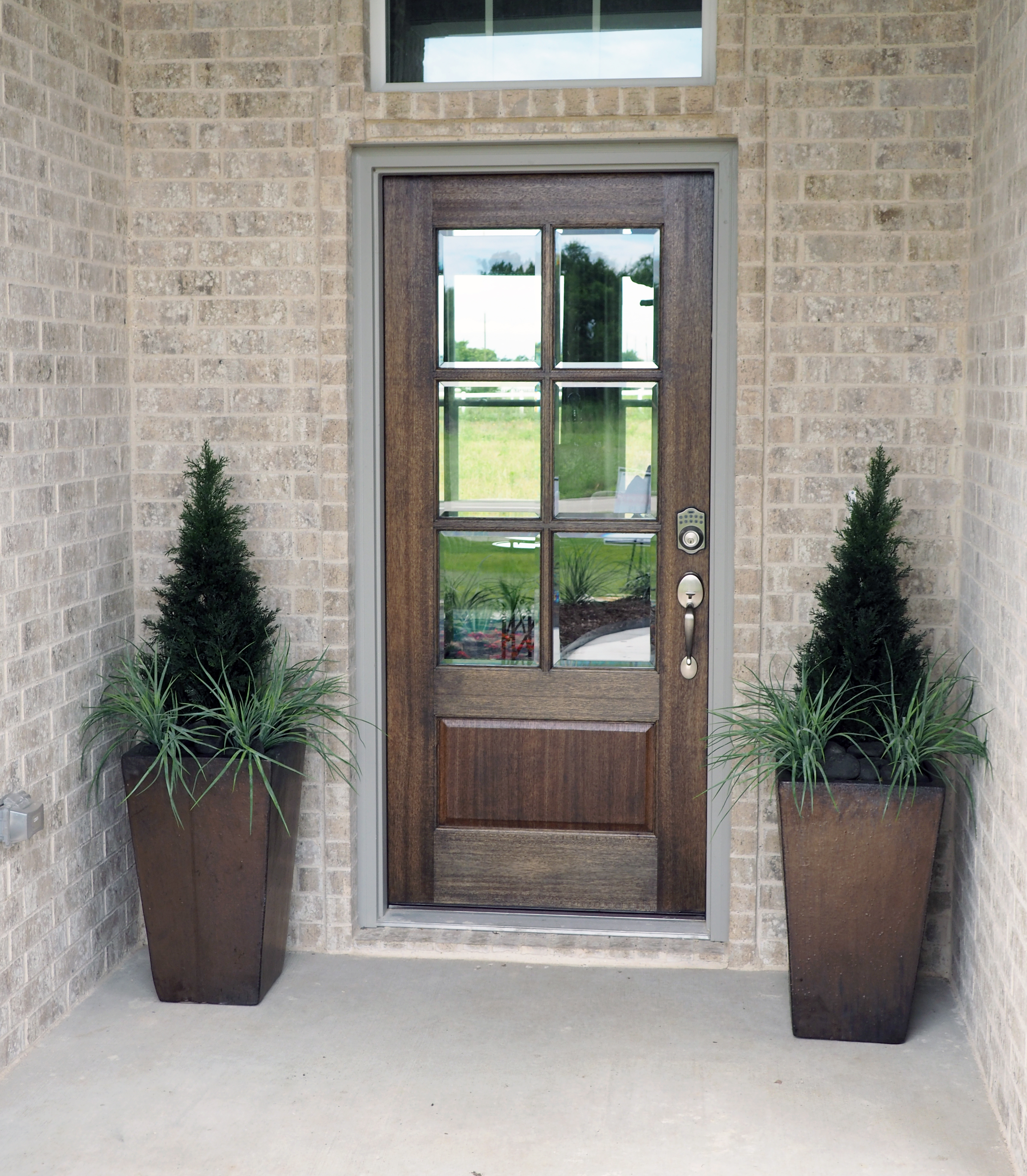 Faux Juniper trees and grasses