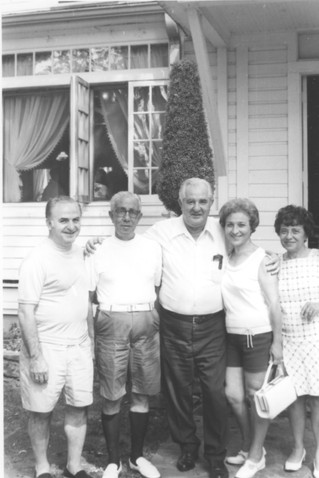 Jack posed with thousands of guests over the years. Here he poses with visitors in front of the dining room.