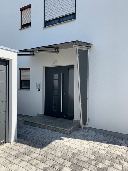 Vordach Reutlingen, Tübingen, Stuttgart, Metzingen, Metallbau, Überdachung, Glas, Schlosserei