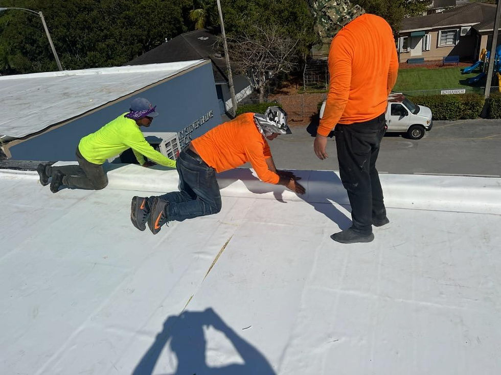 Commercial white TPO flat roof installation by Advanced Roof Tech roofing contractors