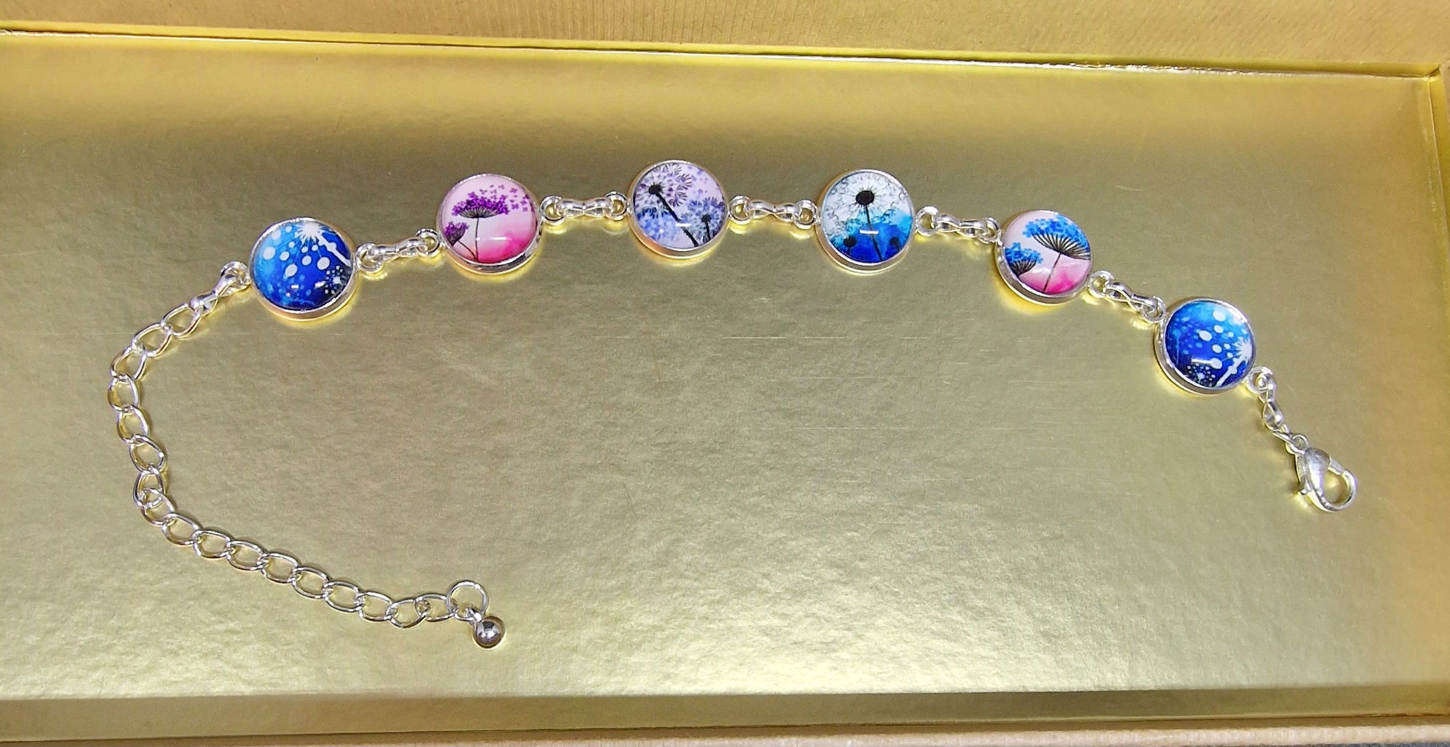 Bracelet argenté cabochons fleurs rose et bleu