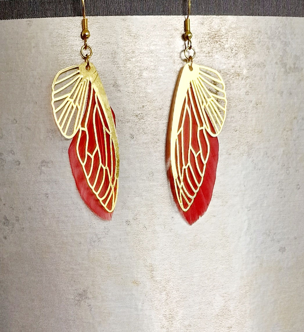 Boucles d'oreilles ailes papillons dorées plumes orangées