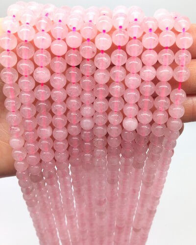 Quartz rose A perles 6mm sur fil 40cm