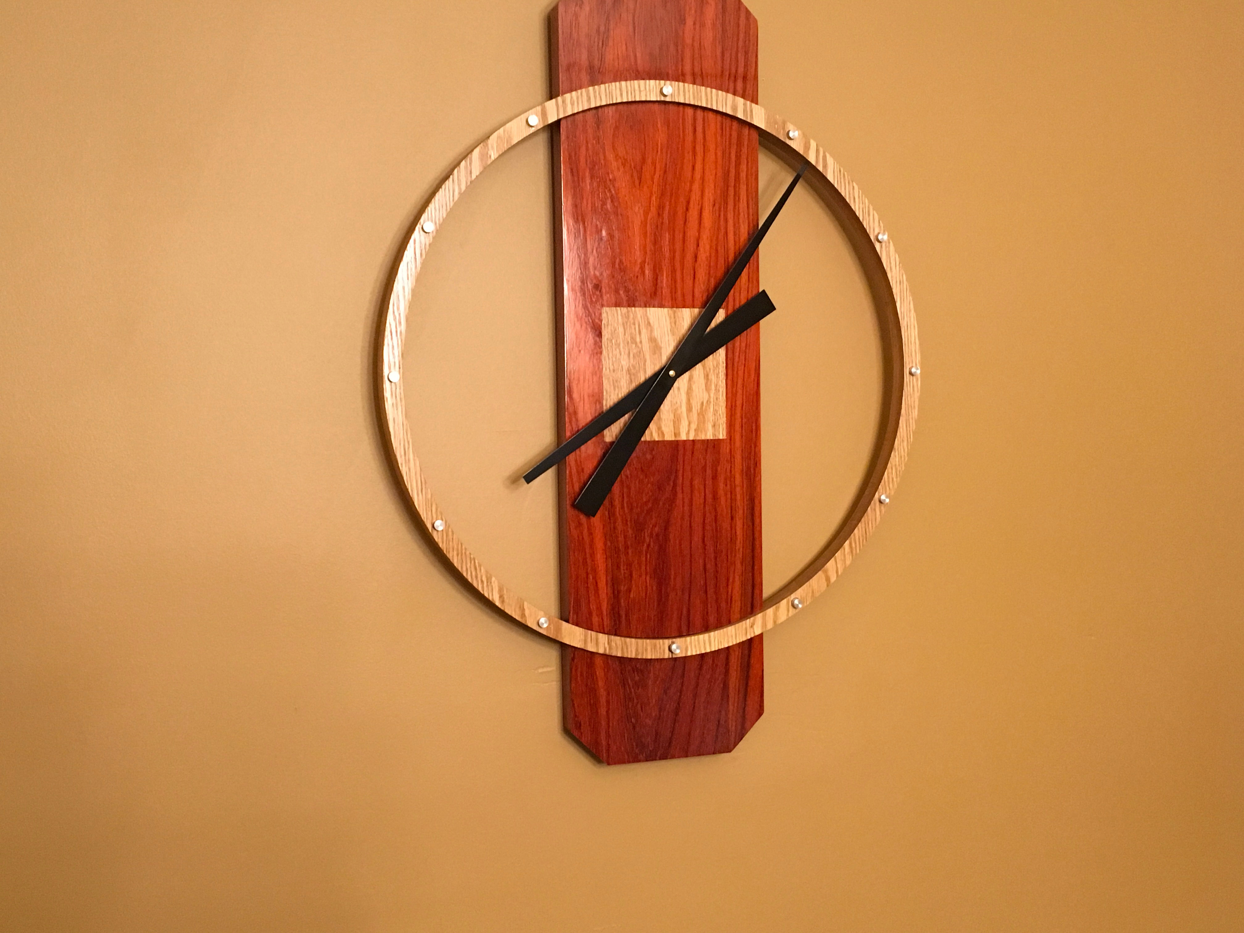 Circle Paduk and Red Oak Wall Clock