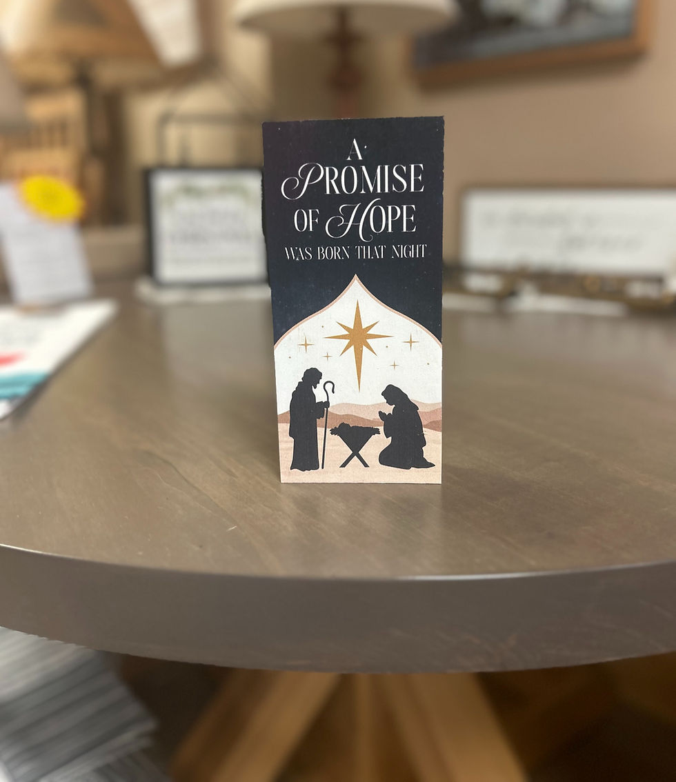 christmas decor on a strathroy table in cinnamon cabin co showroom