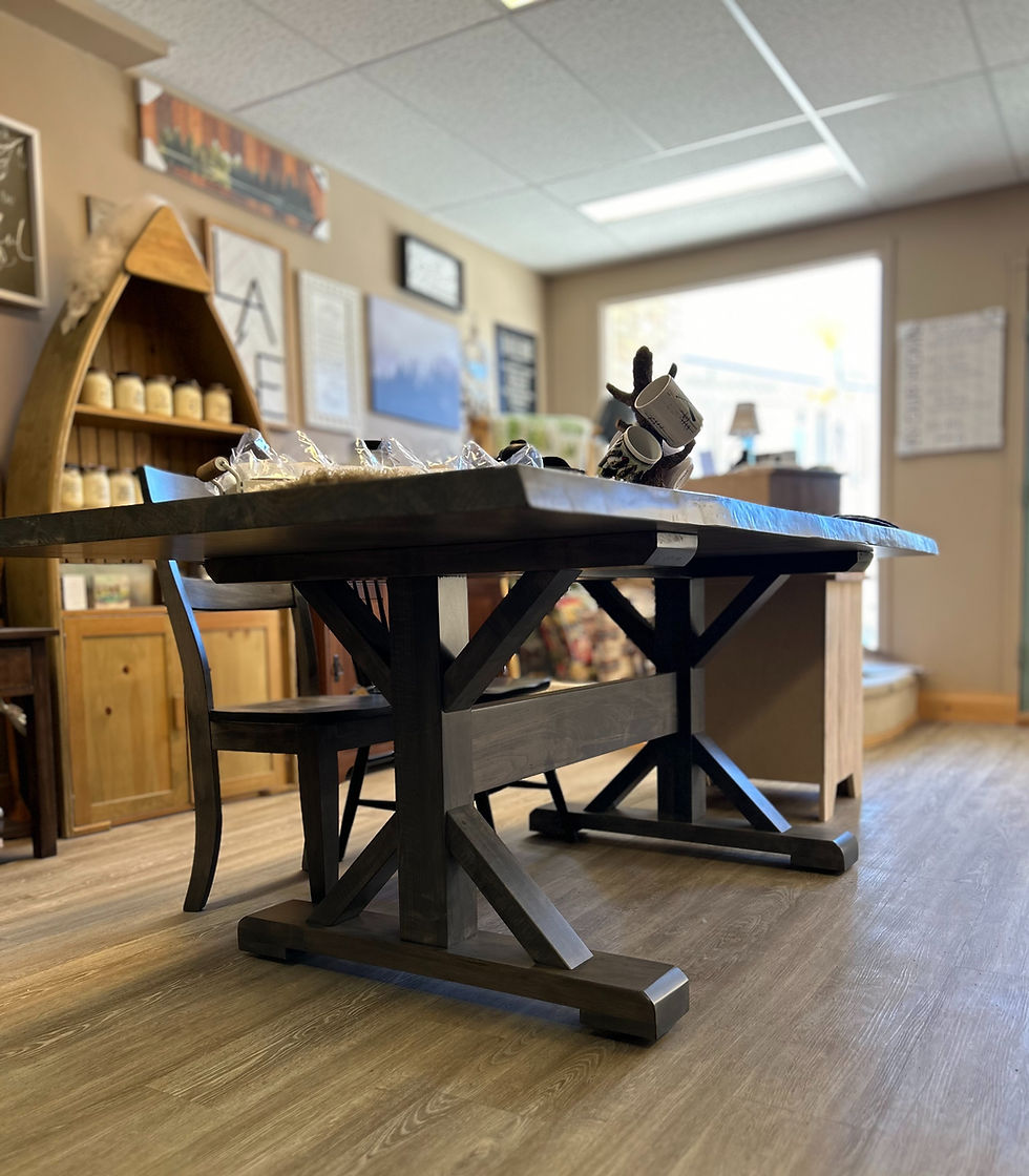 cambridge live edge trestle table handcrafted in ontario in the cinnamon cabin co showroom