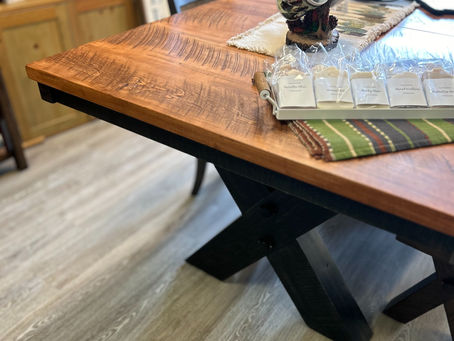 niagara rough sawn dining table in cinnamon cabin co showroom