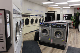Inside view of The Laundry Room Coin Wash laundromat in Waterloo, Ontario. 