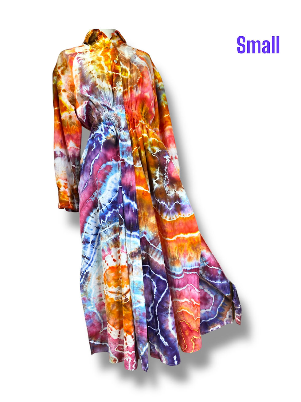 small sherbet colored shirt dress with buttons pockets cinch waist and a pretty flower