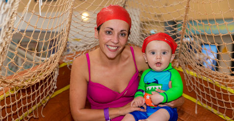 Mother with child in aquazone