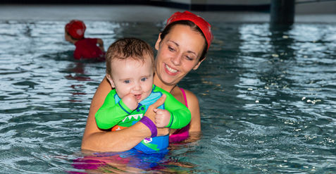 a mother with her baby at the aquazone
