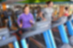 People running on treadmills at Campus Fitness gym