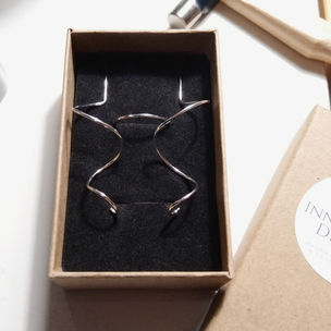 Sterling Silver Twirl Drop Earrings and Single Ring with Lightly Hammered Surface for Extra Shine.