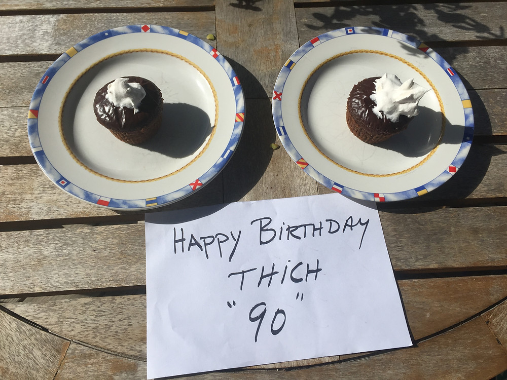 Janice and John celebrating Thich Nhat Hahns Birthday this morning. Thich is 90 years old. Cupcakes made by our dear friend Mary Jo. Namaste.