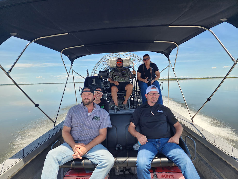 enjoying Bimini top shade on airboat ride