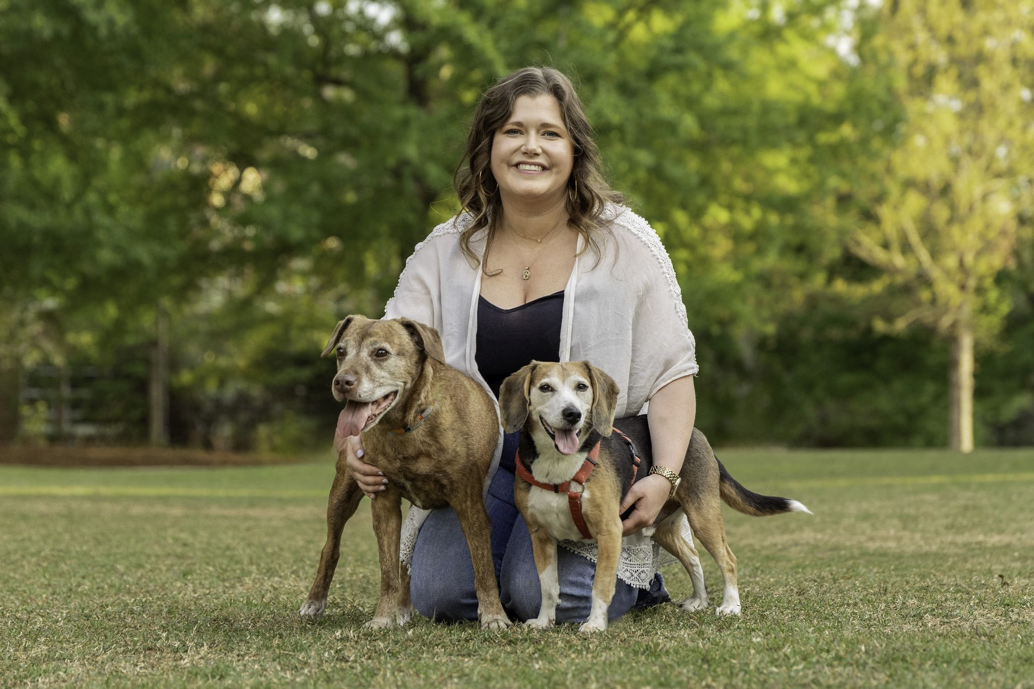 owner with two pet dogs at UGA in Athens GA in a pet portrait